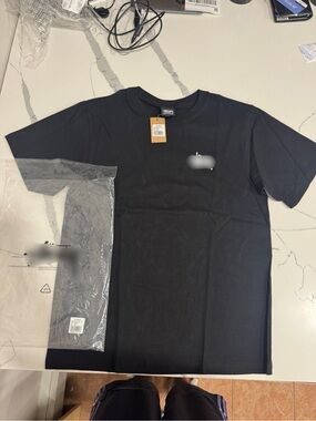 Stussy Black Short Sleeve Tee with Small Chest Logo
